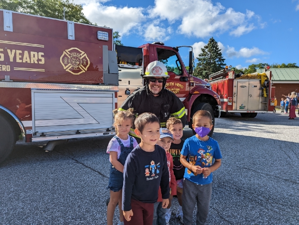 students with fireman