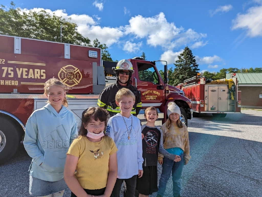 students with fireman