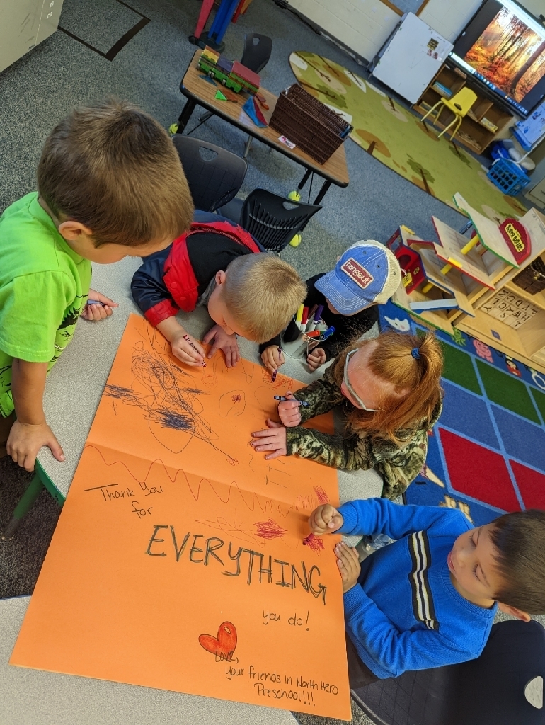 preschool coloring a large orange card
