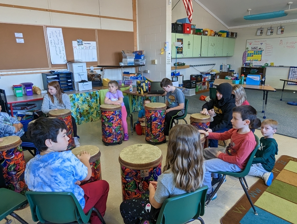 students in drumming circle 