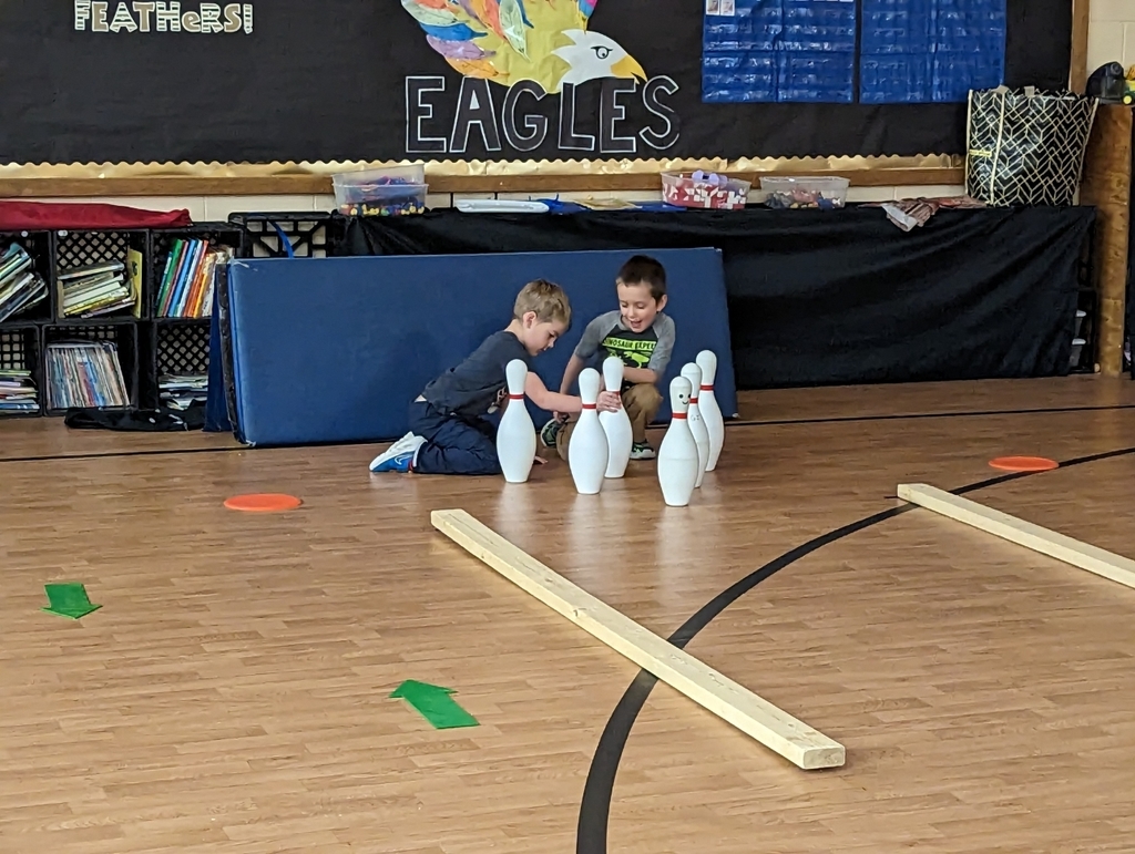 students bowling in gym