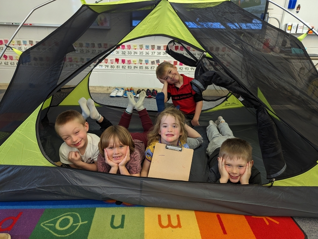 students in a tent in the classroom