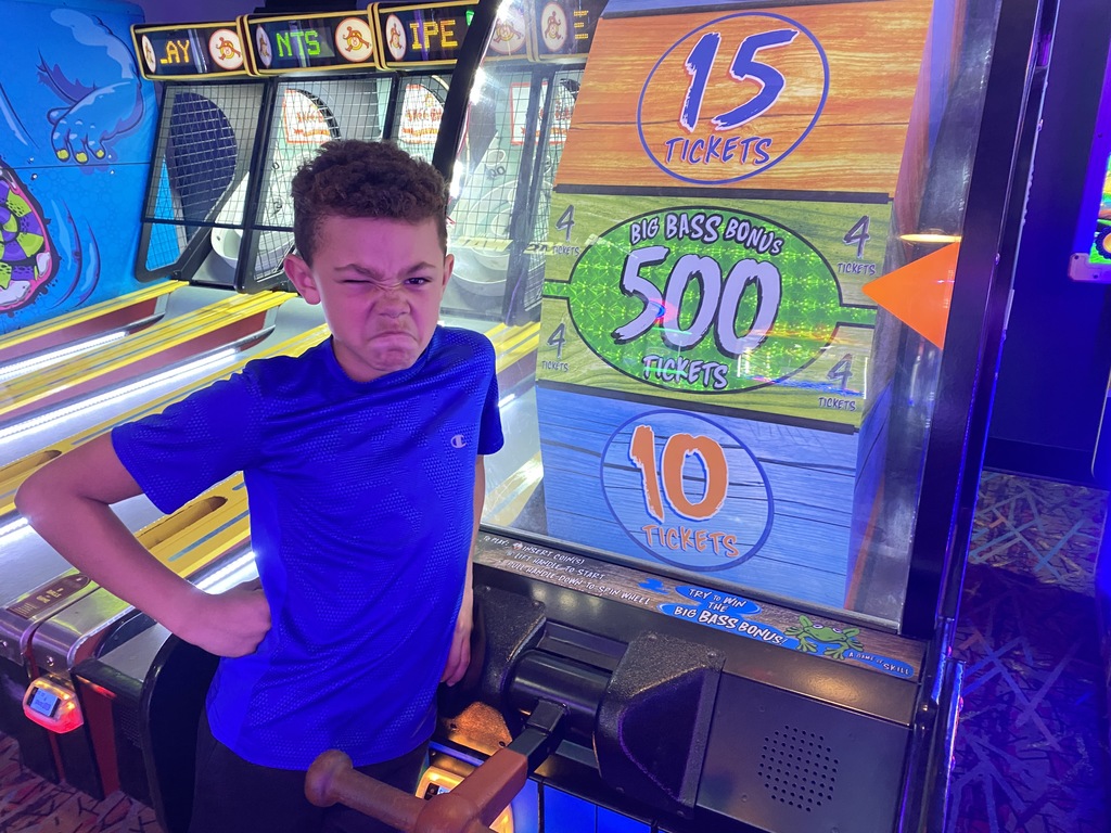 student in arcade