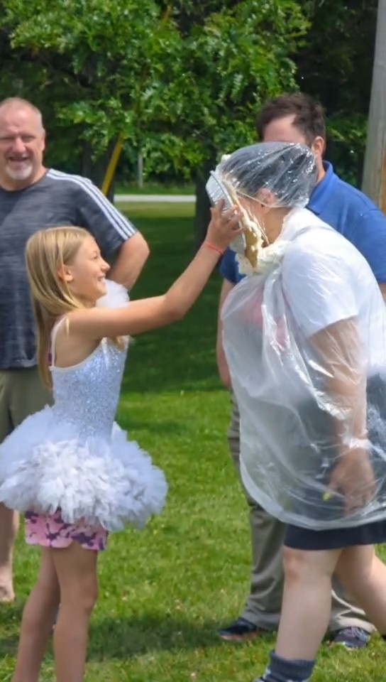 student pieing principal in the face as part of school incentive