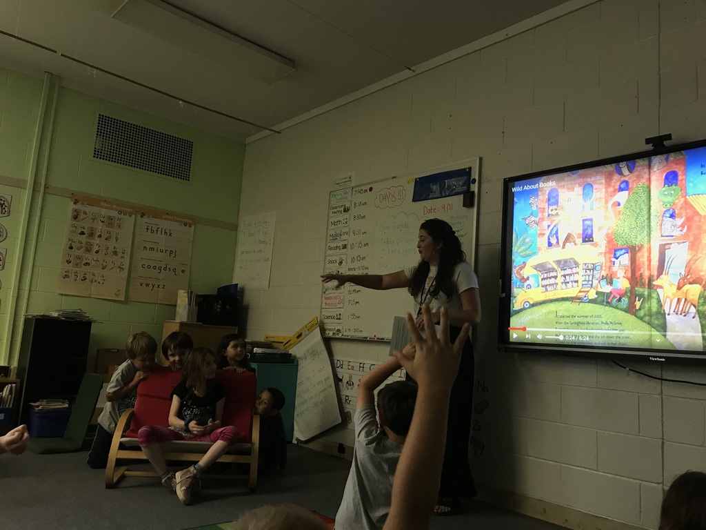 K-2 class reading "Wild About Books".