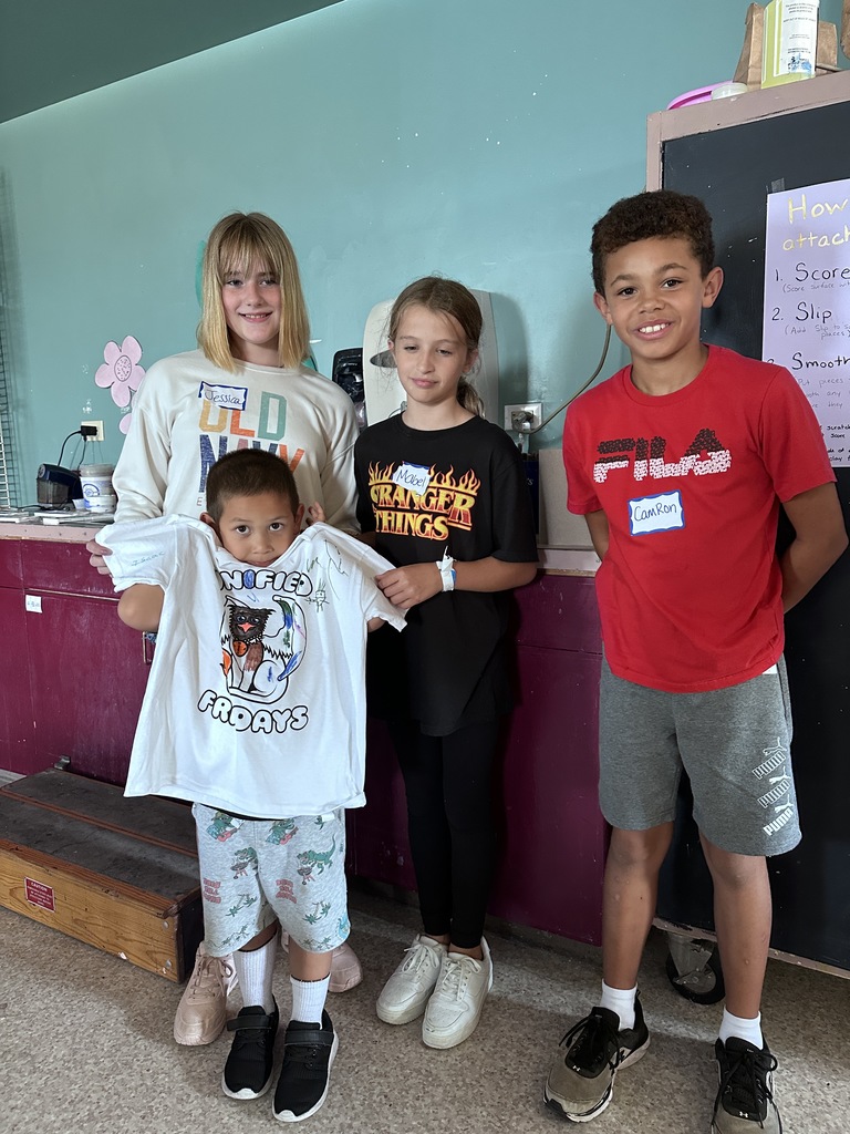 group of students showing off the finished t-shirt