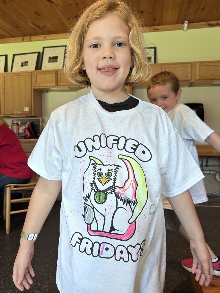 Student wearing unified friday t-shirt
